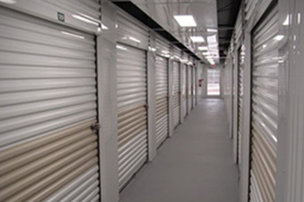 Top rolling steel garage door repair.